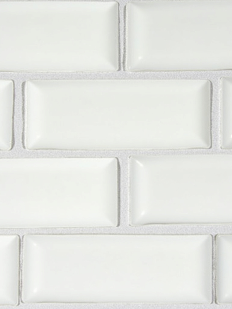 Close-up comparison of white subway tile backsplash with light grey grout and dark grey grout